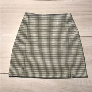 Plaid green skirt with slit on thighs
